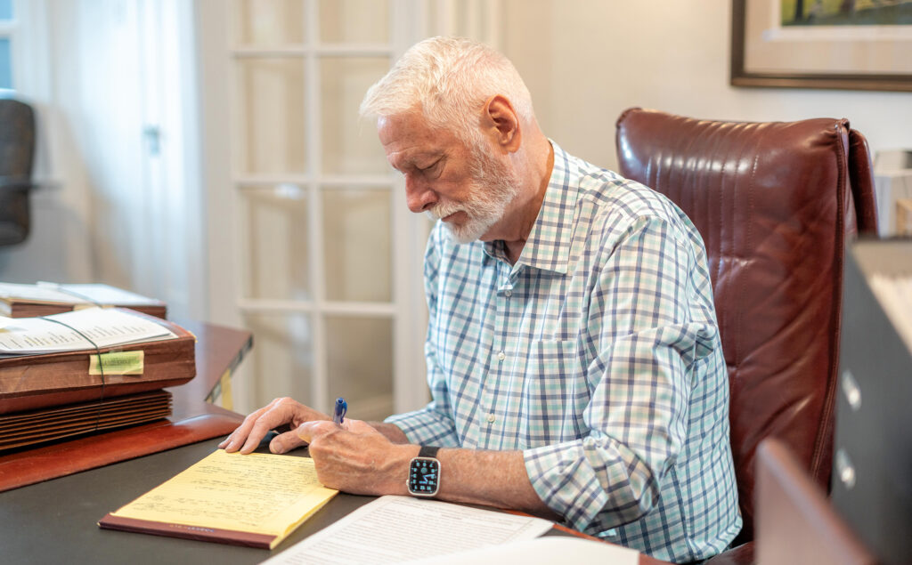 personal injury lawyer writing case notes